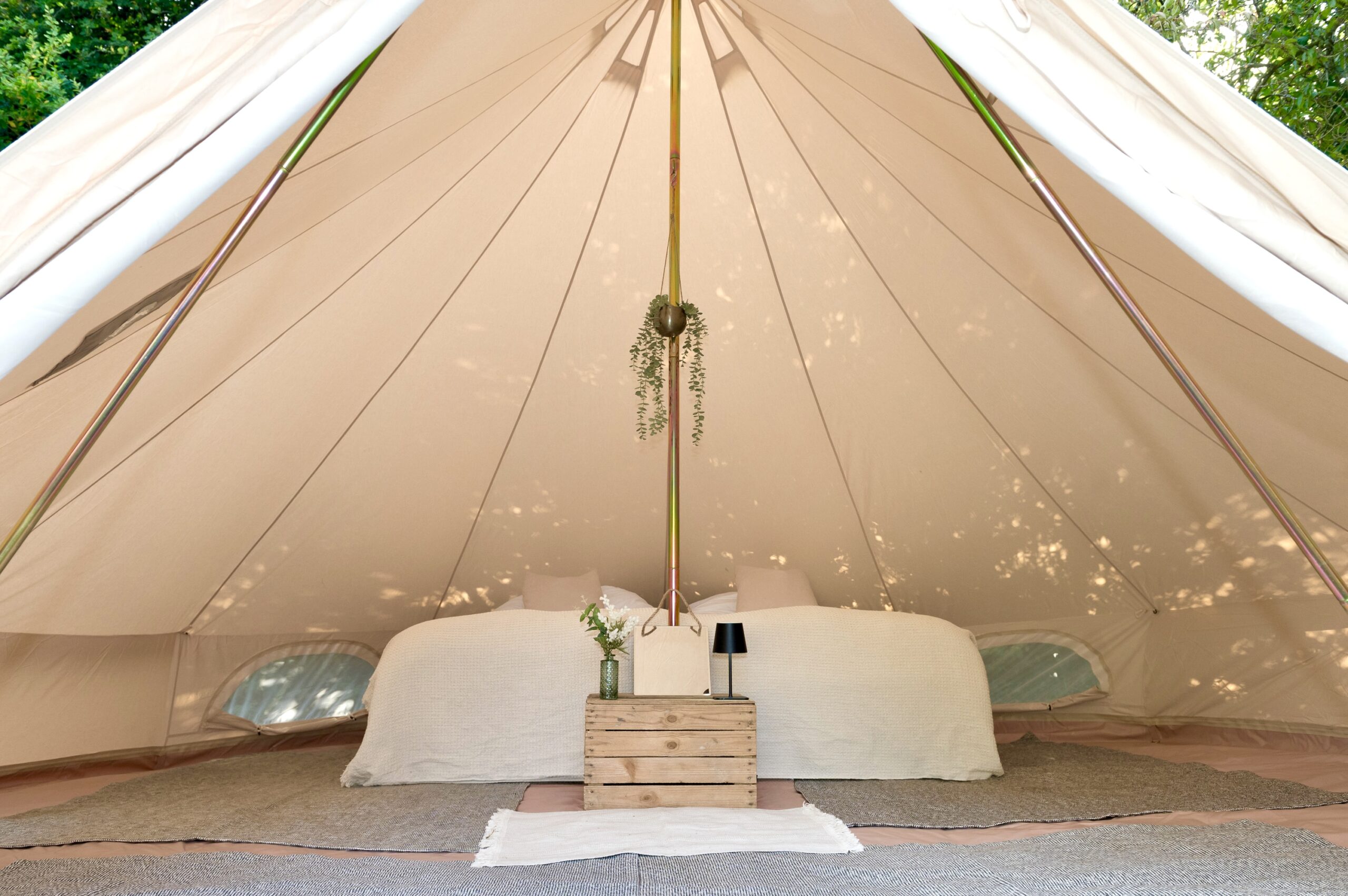 Festival bell tent hire interior with cosy beds